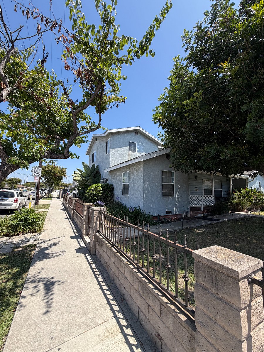 Photo of entire house. Apartment is the second story