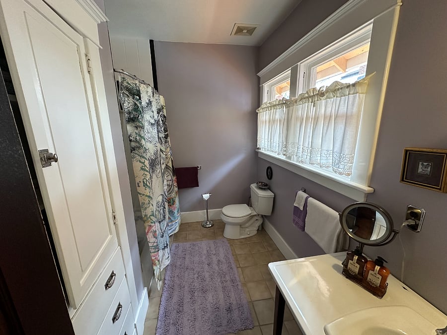 Full bath with great lighting and additional  built in storage