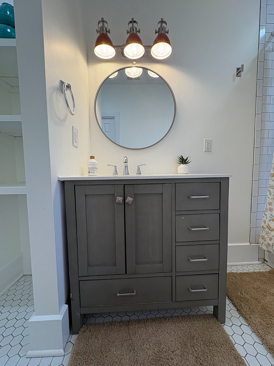 Vanity area in Bedroom 2, with a blow dryer provided in the full bathroom