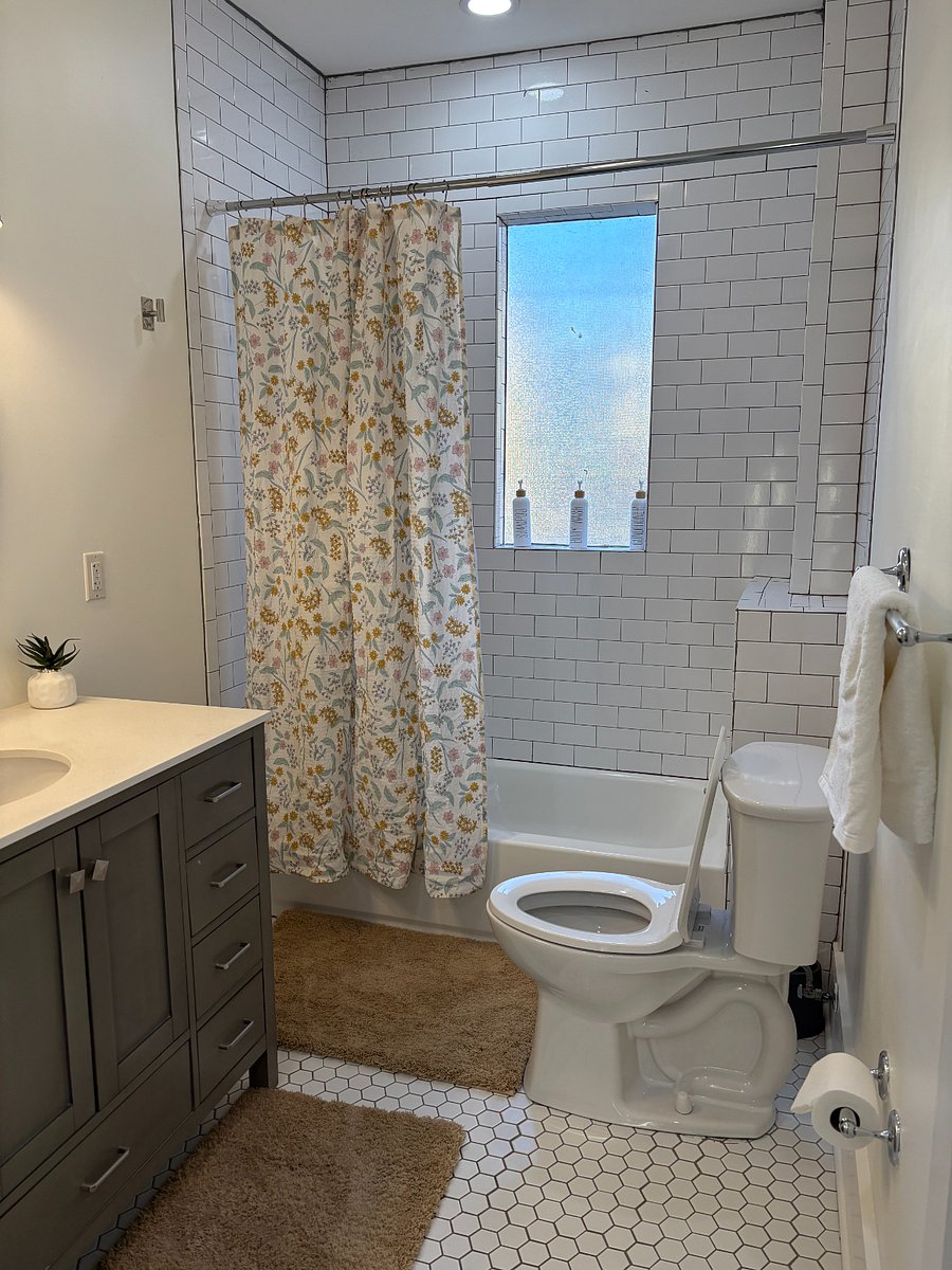 Bathroom 2 is a full bathroom that features a tub and shower combination