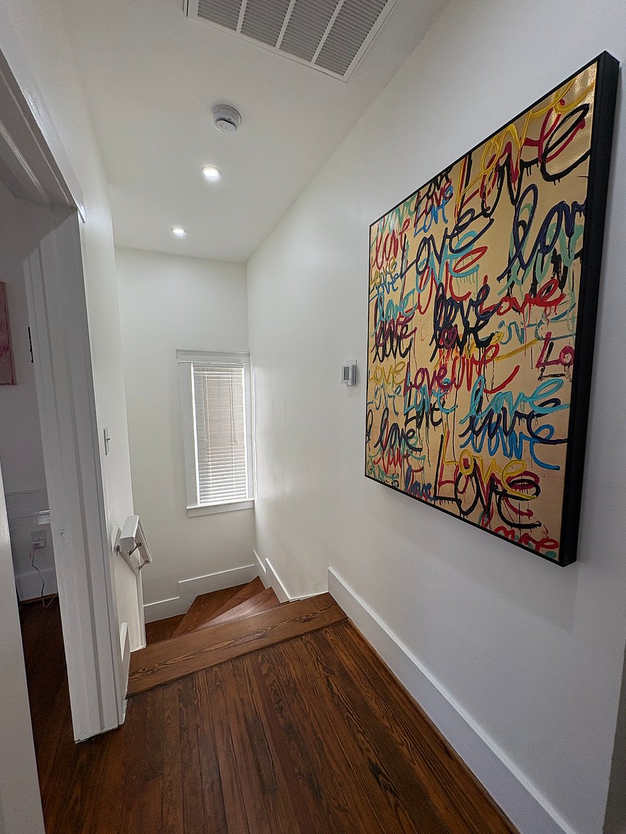 View from the top of the staircase leading downstairs to the Main Level