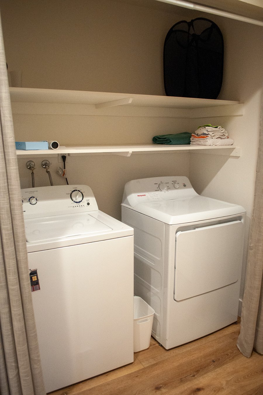 Washer and Dryer with Spacious Shelf Space and Ironing Facilities; Curtains to close