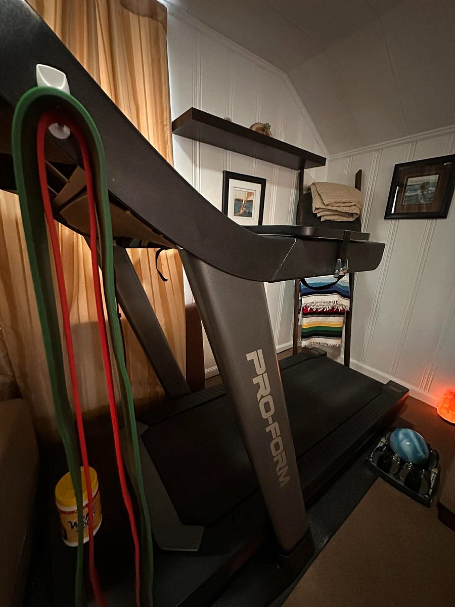 Gym-Quality Treadmill with Removable Desk Private workout room: gym-quality treadmill with a removable walking desk work and move at the same time.