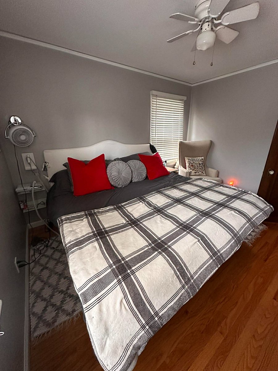 Bedroom One - King Primary bedroom: nightstands with ports to make phone charging easy on both sides. Keep it EXTRA COOL with a ceiling and side table fans.