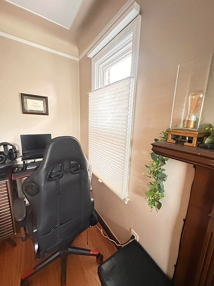 Gaming chair and desk in the main room so you can keep an eye on teen usage or get great natural light for a team zoom call.