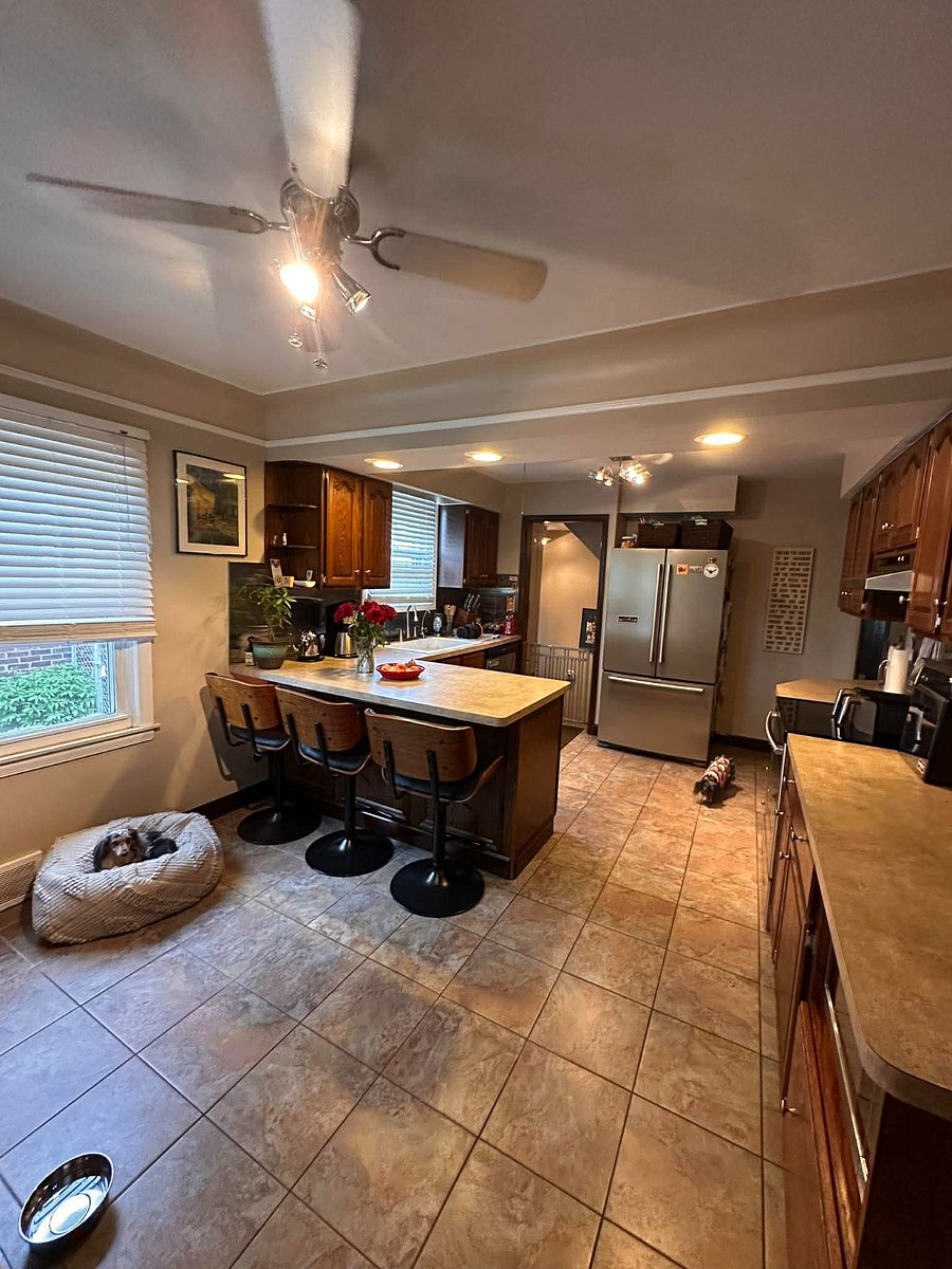 Extra big kitchen with room for your dog and three big comfy stools. LOTS of counter space.