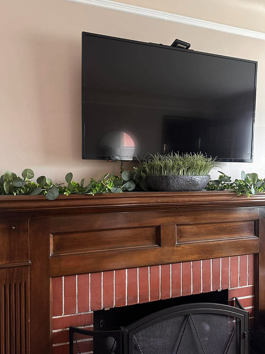 Beautiful fireplace with big screen TV