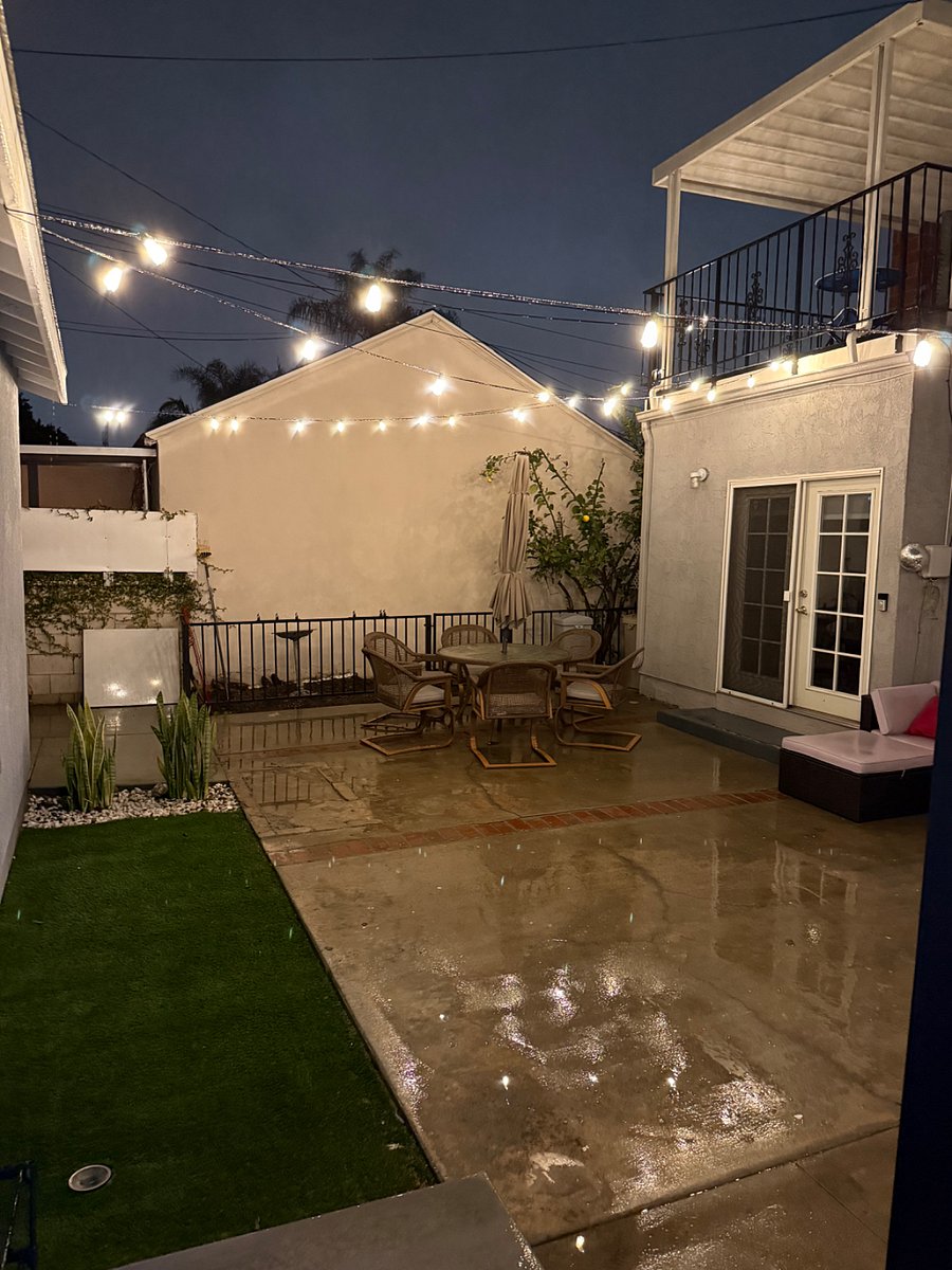 Shared outdoor space. Double doors is the front home.