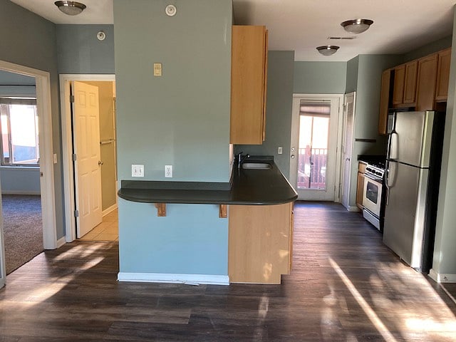 breakfast bar has stools