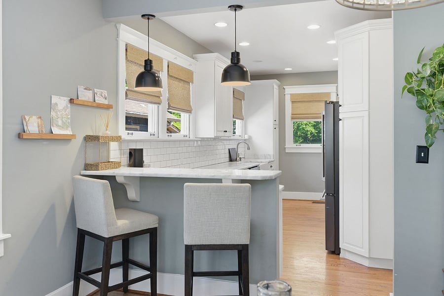 Marble counters, Comfy RH barstools help the bar double as a working space when needed. 