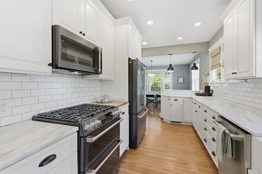 Pantry, cabinetry, and drawers galore. You'll love that  the kitchen is fully stocked with everything you need to prep meals