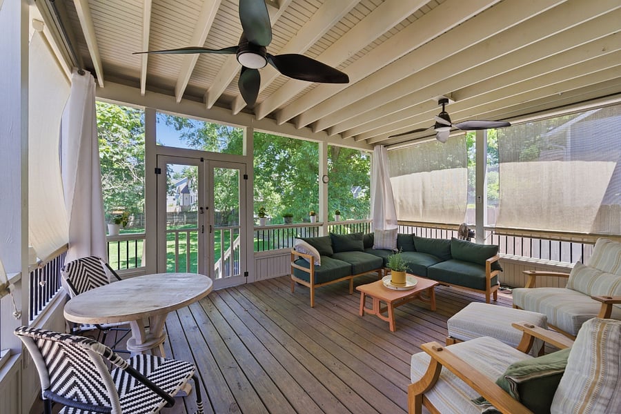 Screened backporch with TV, Sonos soundbar, sectional, comfy chairs, and bistro seating for two. Ceiling fan, kitchen access, and your new favorite hangout spot