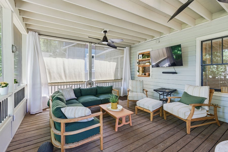 Summer Classics premium teak seating with plush cushions makes the screened porch impossibly comfortable. Sink in and never leave.
