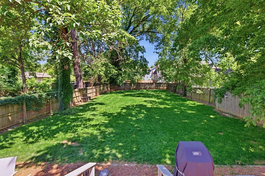 Open lawn surrounded by mature trees and fencing gives you a private sanctuary right in your own yard. Perfect if you work from home, have pets, or just want a peaceful place to relax.