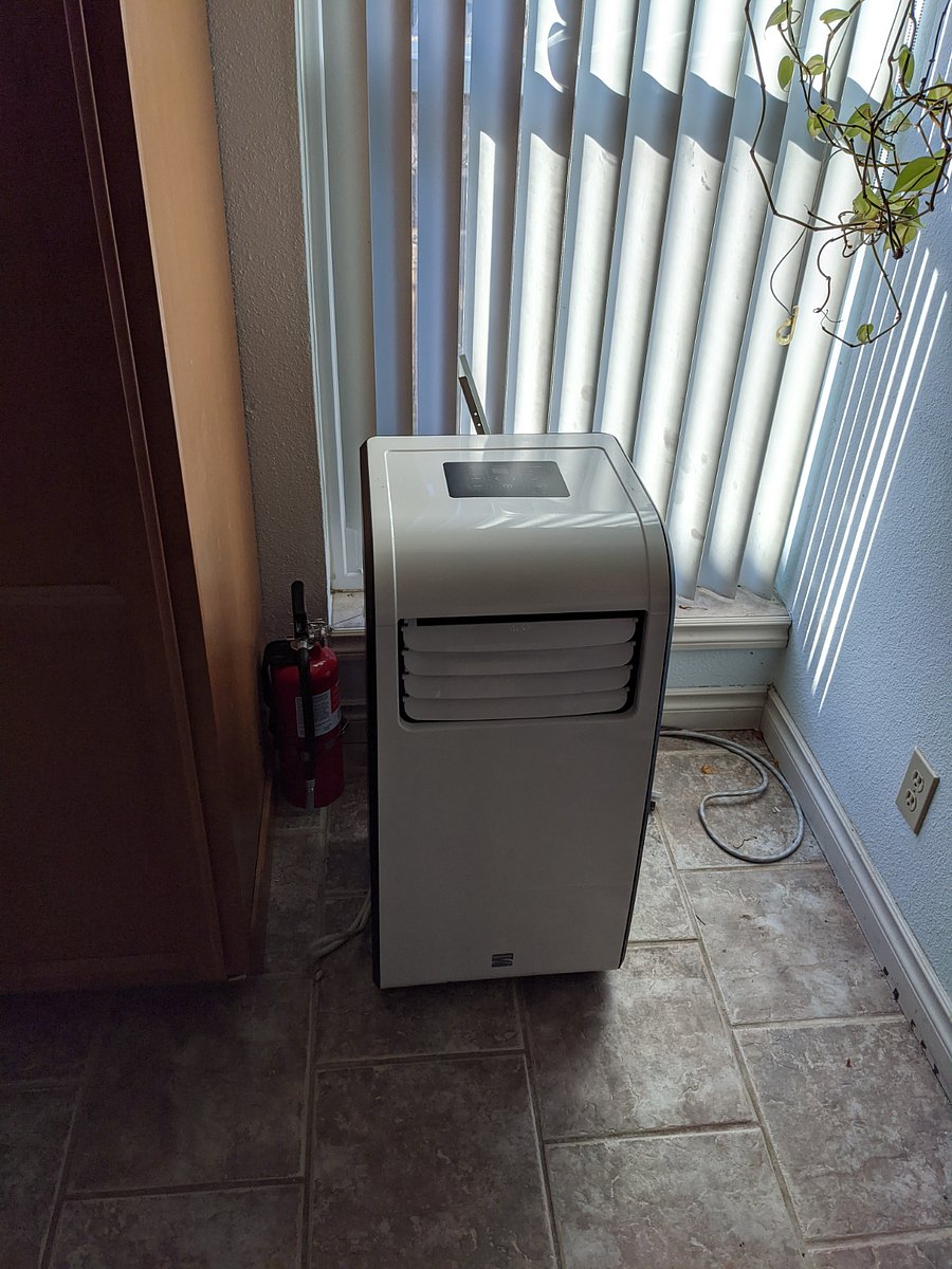 Window air conditioner (in kitchen)