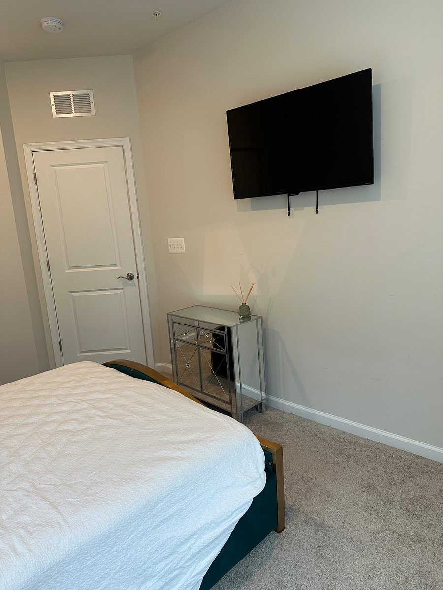 Comfortable queen bed with smart TV