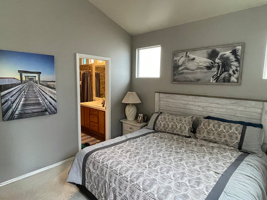 Main Bedroom - select Comfort bed, two night stands with drawers, seven drawer nightstand, TV, remote fan & light, and Chase lounge. The master bath has two sinks, walk-in shower and walk-in-closet as well. Sliding glass door exit to deck and hot tub. 
