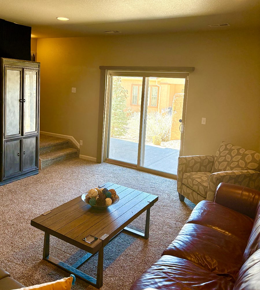 Ground level with a sliding door out to your own private patio