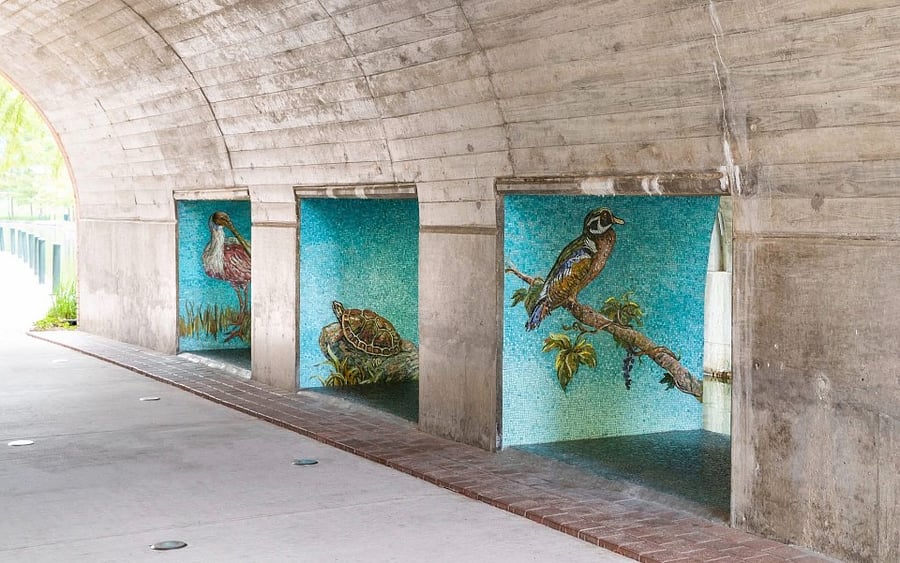 Beautiful artwork along the woodlands waterway.