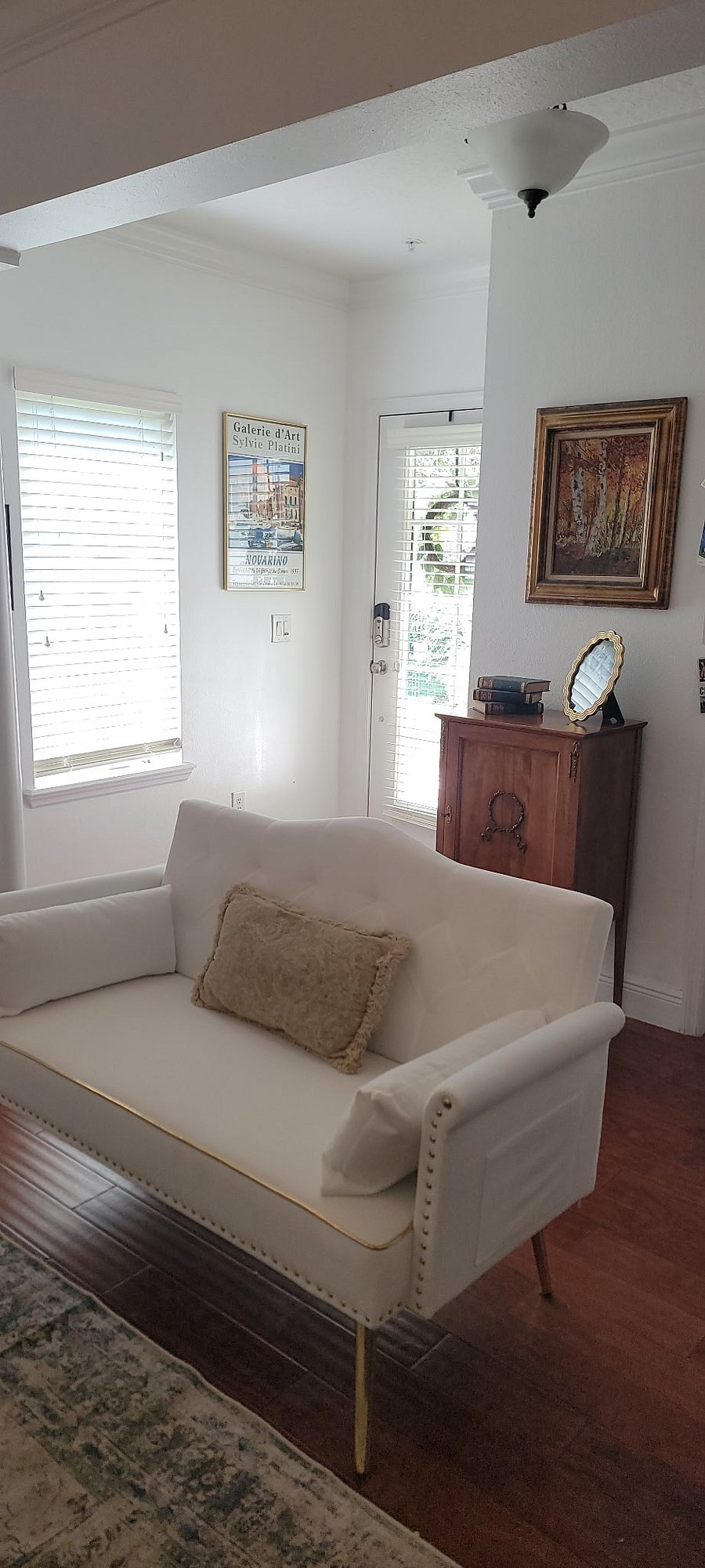 Front Entryway and living room settee