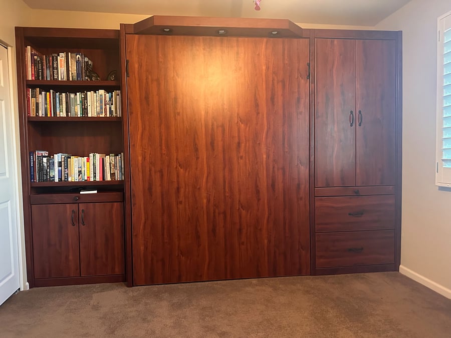 Guest bedroom, with wall bed in up position...