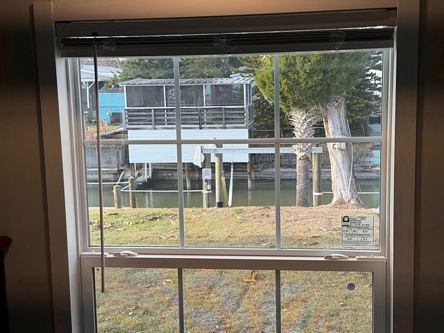 View of backyard and canal from 2nd bedroom