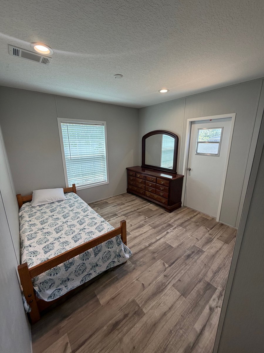 3rd Bedroom with door to deck and backyard