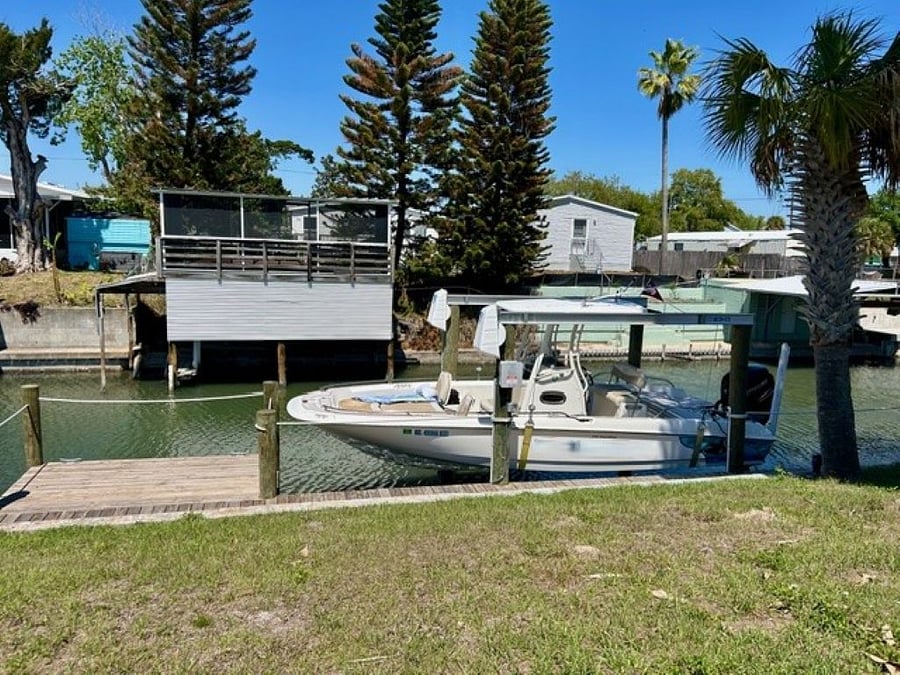Boat lift accomodates up to a 24' boat.  BYOB (Bring Your Own Boat)