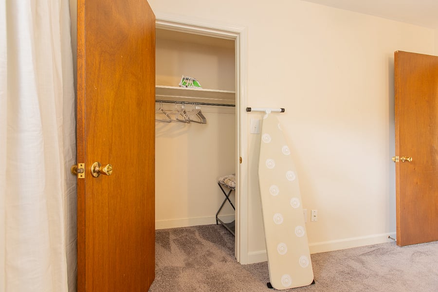 Main Bedroom Walk-in Closets, Ironing Board & Iron