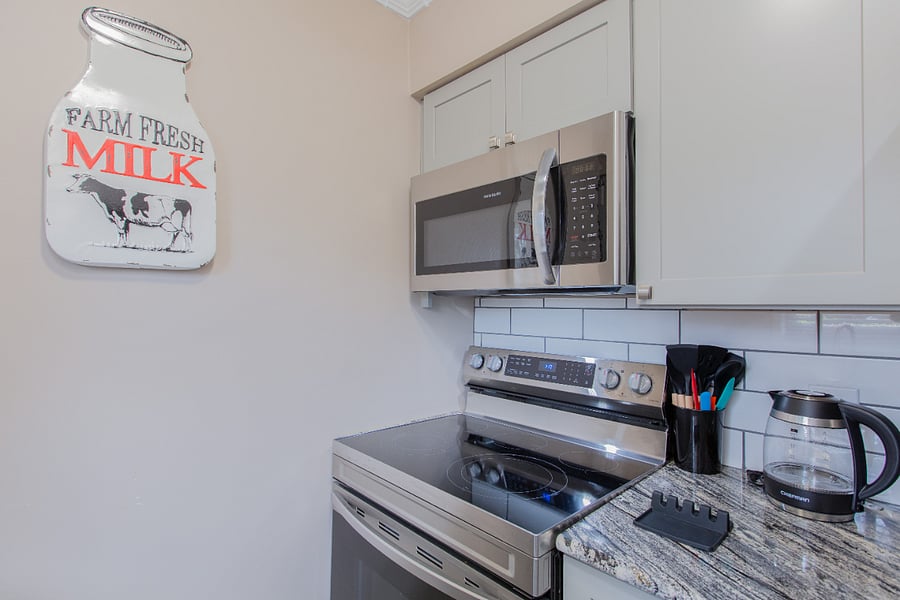 Microwave, Self Cleaning Convection Oven, Glass Stove Top.