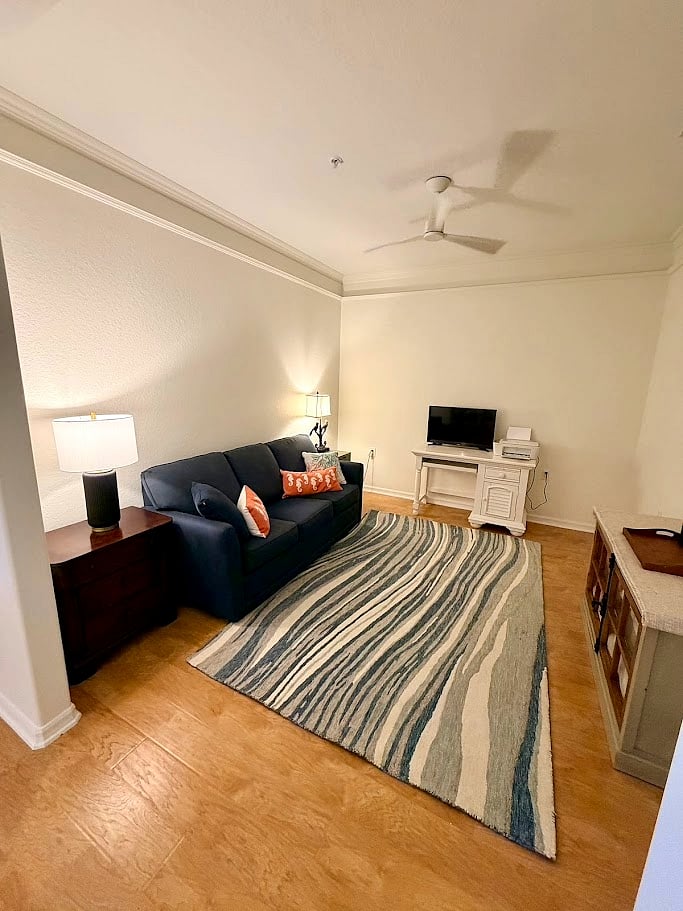 Den that can be used as office space or overflow sleeping with queen sleeper sofa