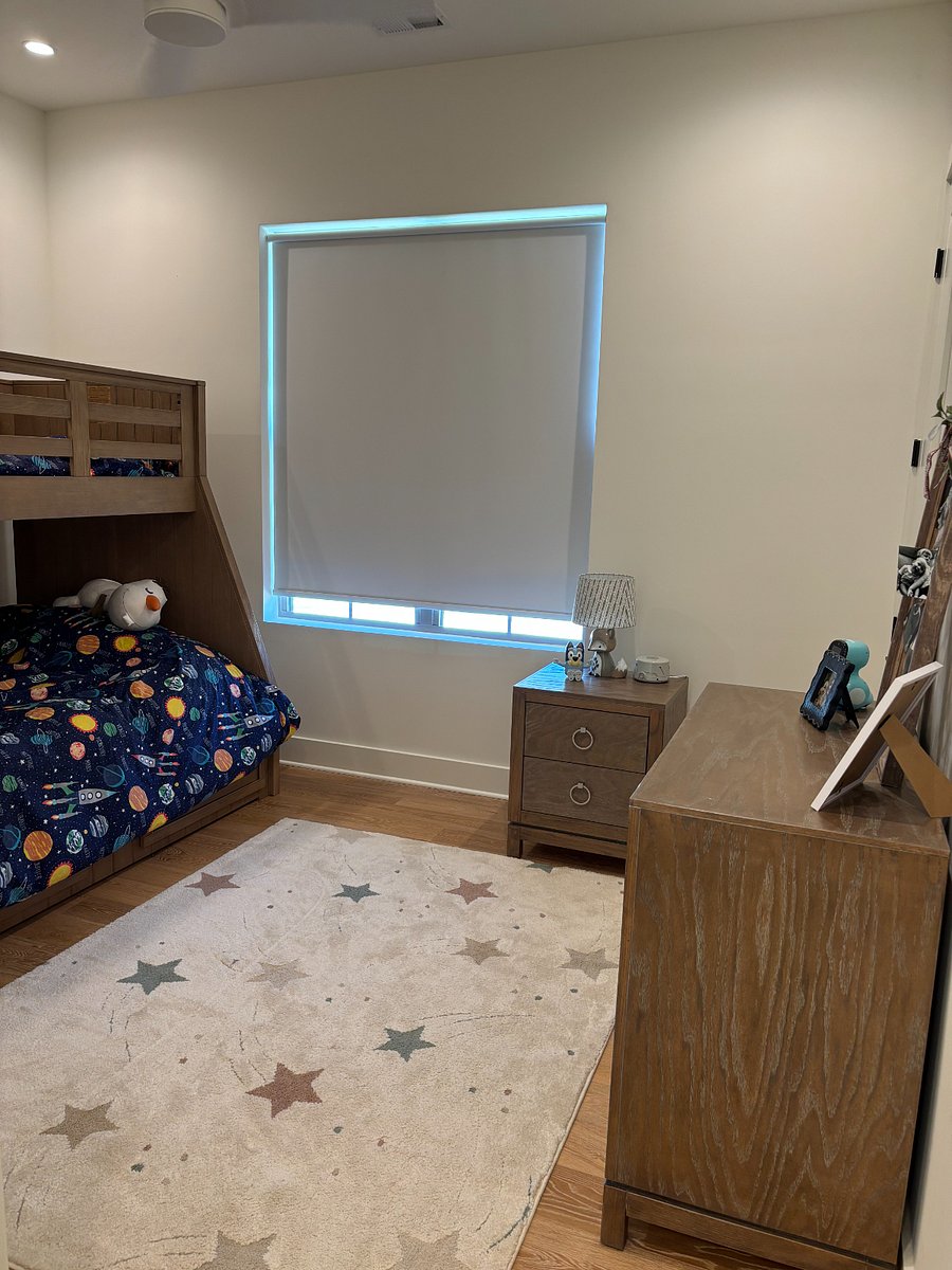 Cozy and fun kids bedroom featuring a bunk bed with a full-size lower bed and twin upper bunk, perfect for families or additional guests. Thoughtfully designed with comfortable furnishings and plenty of space for kids to relax and unwind.