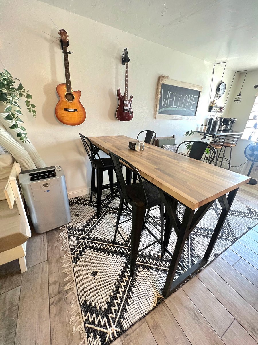 Bar height dining table on casters and portable AC unit