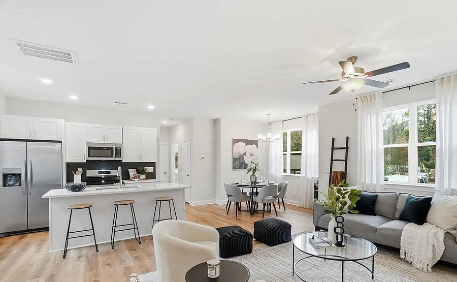 Open floor plan with Living room, Dining, and Kitchen