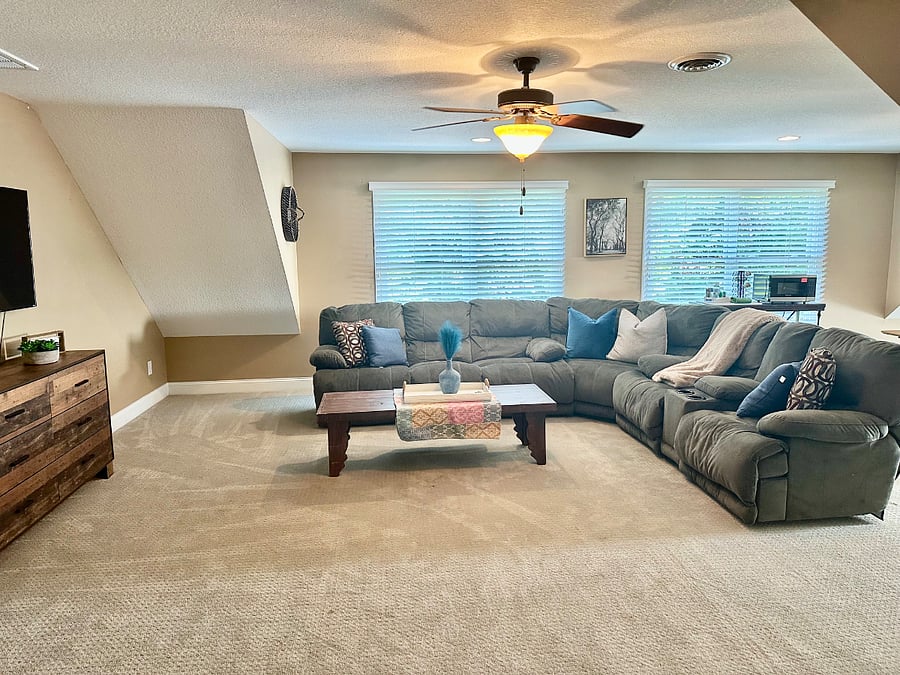 Loft living room space with great lighting, smart TV