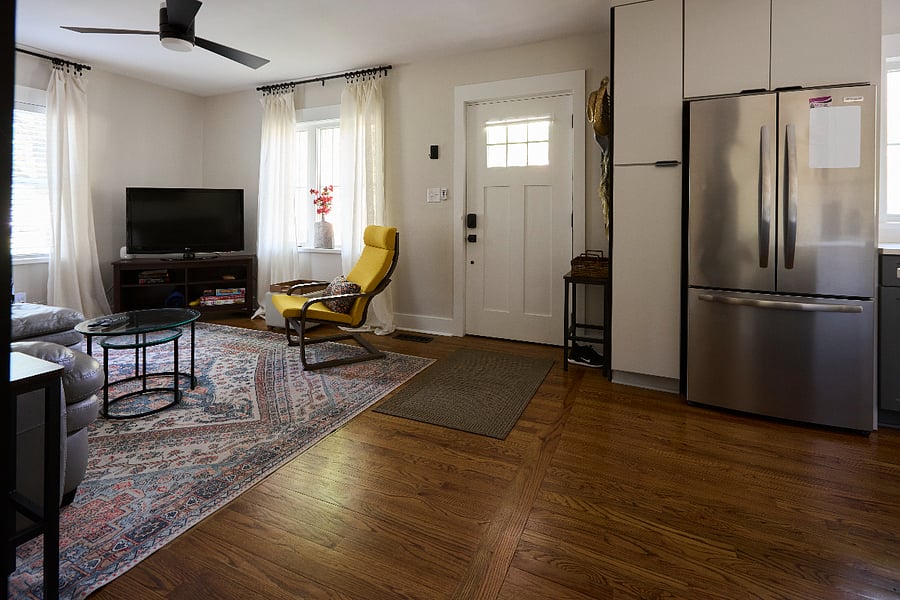 Open floor plan, entryway to living room and kitchen