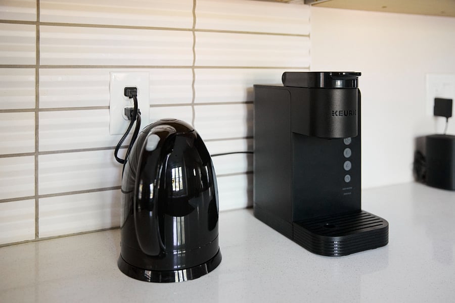 Kitchen - Coffee/Tea Station (selection of teas, condiments), refillable K-cup pods for your favorite coffee grind.