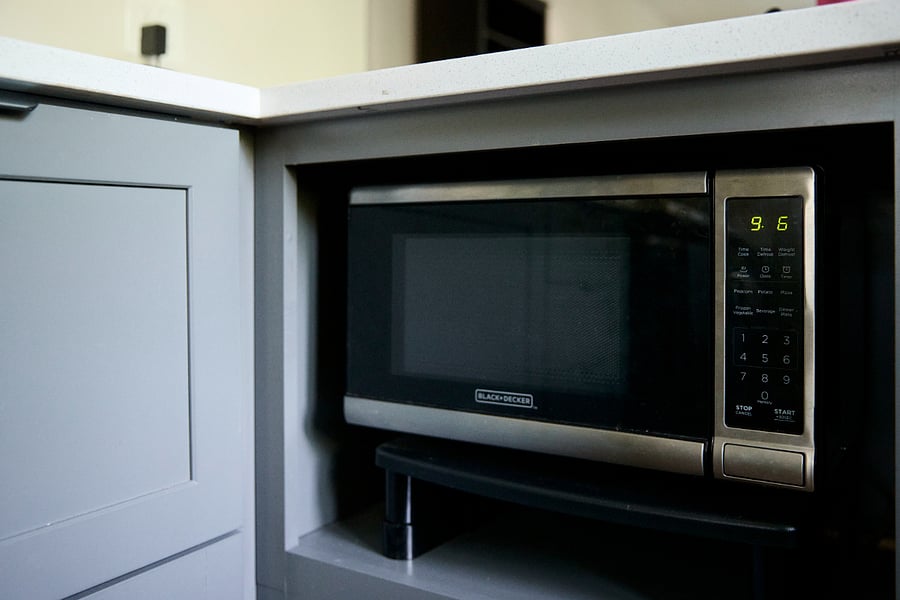 Kitchen - under-counter microwave offers increased counter space.