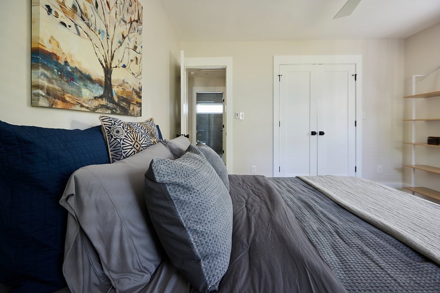 Primary Bedroom - Queen bed w/memory foam topper, ample closet/dresser storage, room-darkening blinds and thoughtful, hotel-inspired comforts.