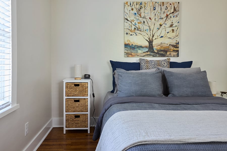 Primary Bedroom - Queen bed w/memory foam topper, ample closet/dresser storage, room-darkening blinds and thoughtful, hotel-inspired comforts.