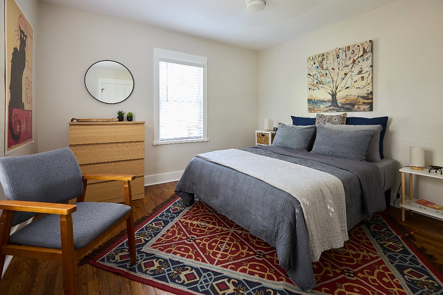 Primary Bedroom - Queen bed w/memory foam topper, ample closet/dresser storage, room-darkening blinds and thoughtful, hotel-inspired comforts.