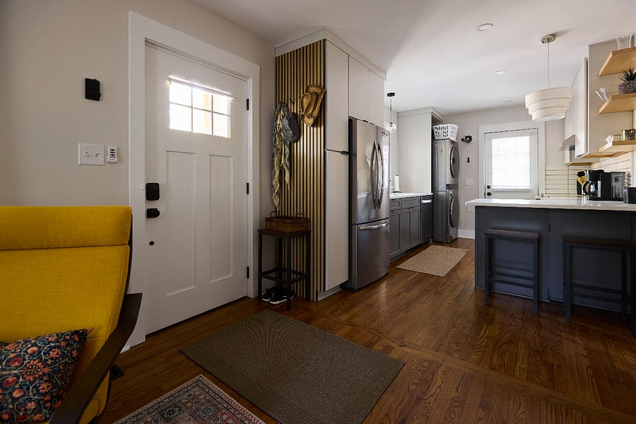 Open floor plan, entryway to living room and kitchen