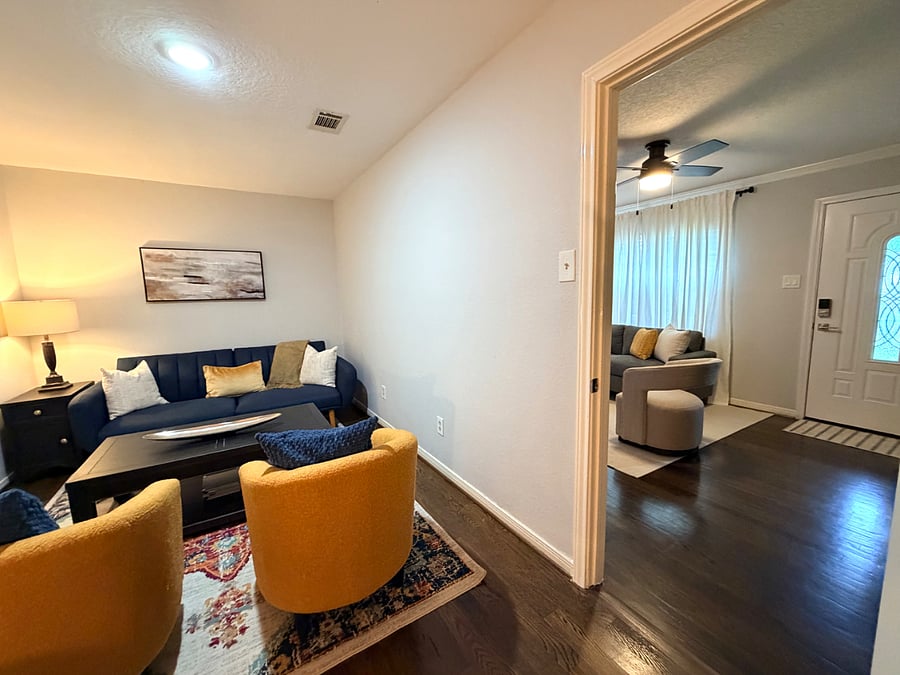 Bonus room as seen on the left. Main living space to the right. 