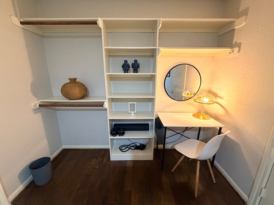 Opposite side of bonus space, desk, and some fitness equipment 