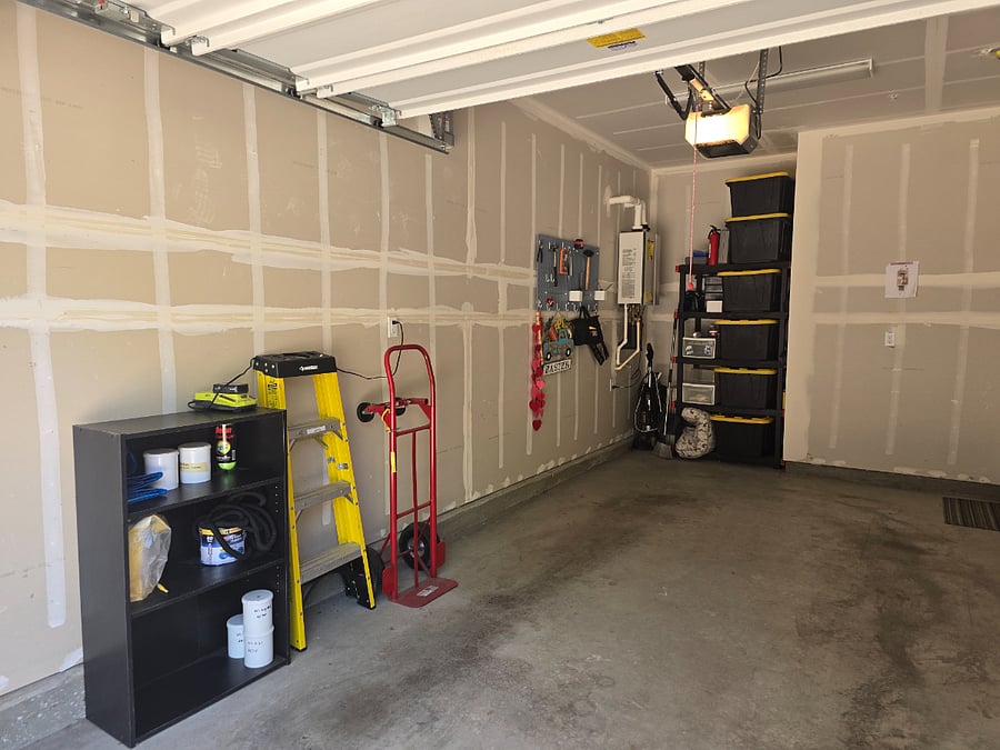 Garage additional wall and storage rack.