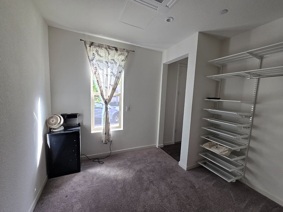 Guest Room Closet and small wine fridge.