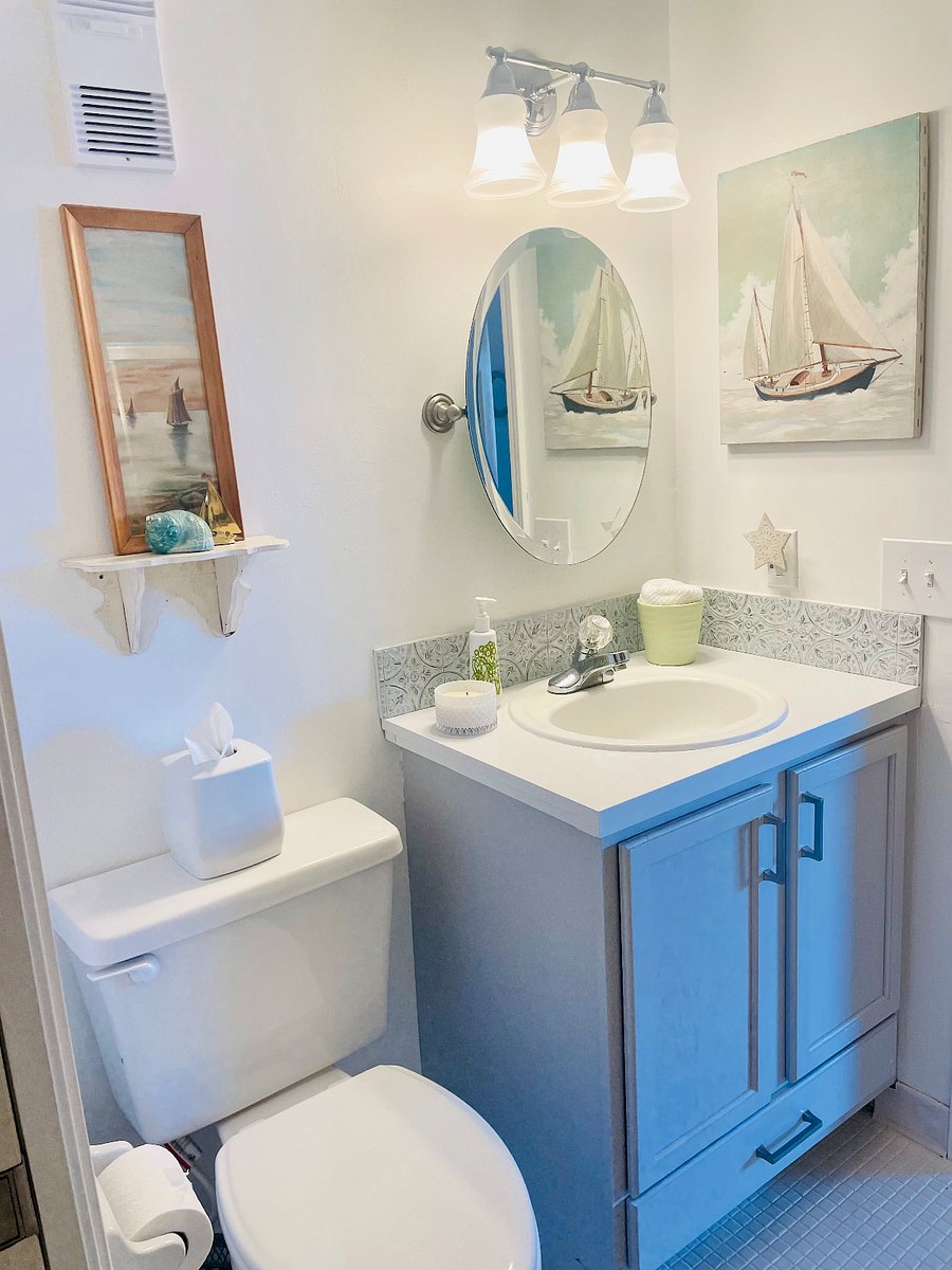 Downstairs bathroom has a walk-in standup shower and full size stackable washer/dryer. 