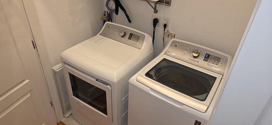 Full size laundry in luxury bedroom suite
