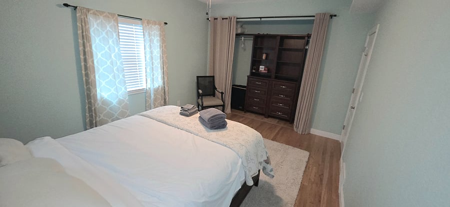 Main floor bedroom with queen bed