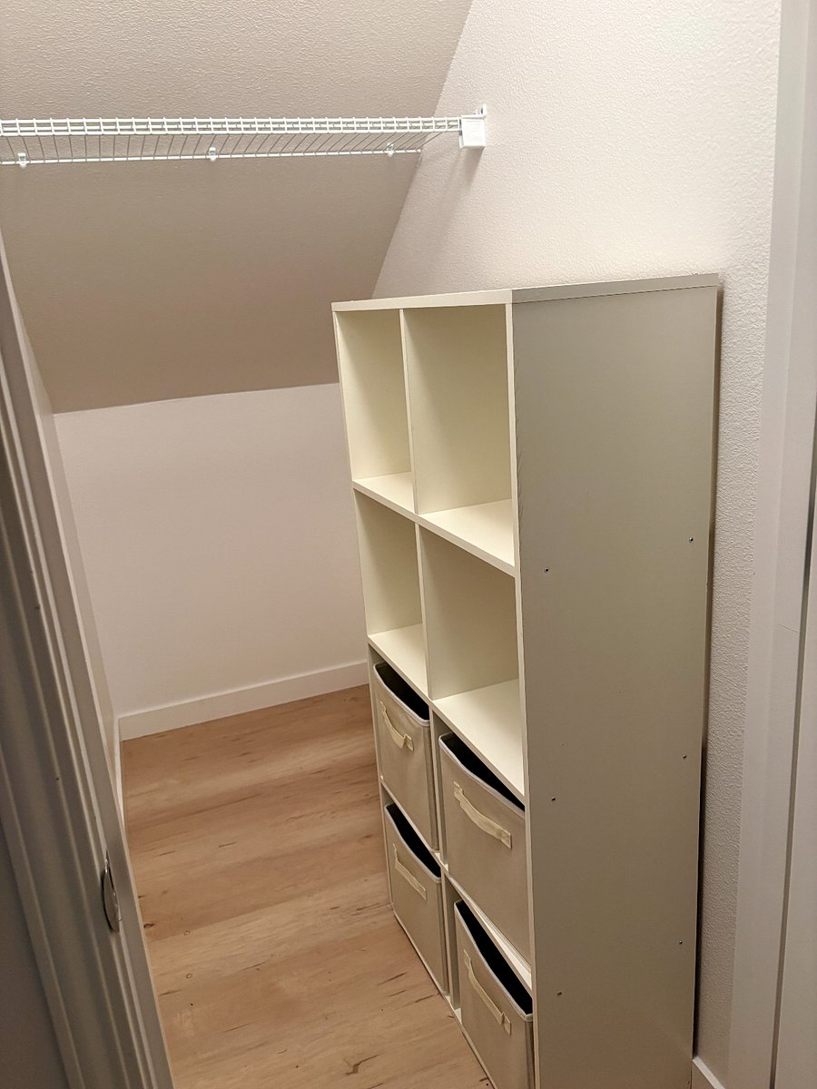 Additional storage if needed in the hallway outside the room.